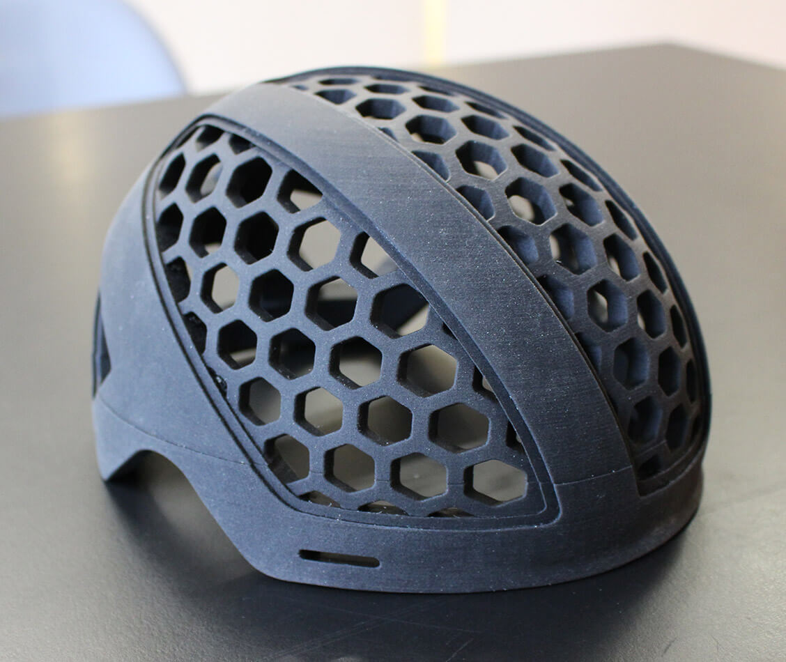 This picture shows a prototyp of the helmet HelMut which was 3D printed in original size with similar material.