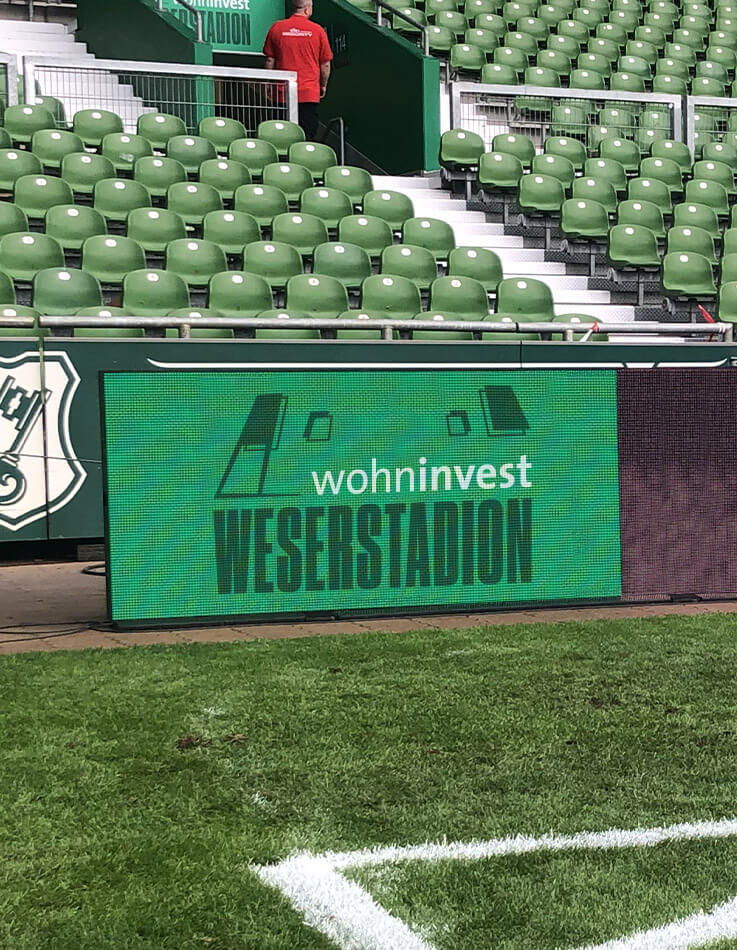 This picture shows the LED-display at the corner of the playing field in the wohninvest WESERSTADION.